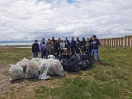 A group of citizens on their own initiative supervised cleaning activities  along the shoreline  of Lake Sevan